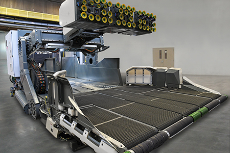 New robotic unloader reduces manual effort required for unloading trucks, trailers and shipping containers at warehousing, distribution and fulfillment centers. (Courtesy of Honeywell Intelligrated)